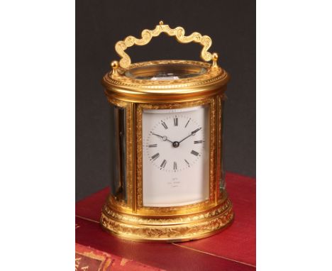 A late 19th century French gilt brass oval carriage clock, by Henry Marc, 6cm dial inscribed No1 HRY MARC PARIS, key-wound mo