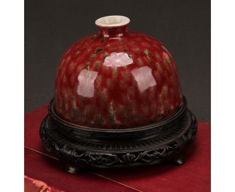 A Chinese taibai zun water pot, mottled tones of red and green glaze, hardwood stand, 15cm high overall, apocryphal Yongzheng