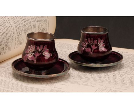 A pair of Korean silver and enamel wine cups and stands, the saucers 7cm diam, 182g 