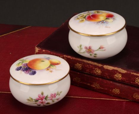 A Royal Worcester circular box and cover, painted by P.M. Platt, signed, with ripening fruit and floral sprays, 7cm diameter,