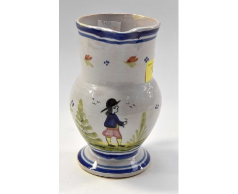 A HB Quimper pitcher/jug decorated in bright enamels, marked, HB Quimper circa 1910 15.5cm high 