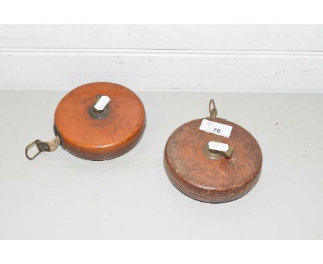 TWO VINTAGE TAPE MEASURES, BOTH MARKED 'TREBLE, ENGLAND', IN LEATHER CASES