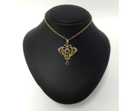 Antique ruby and seed pearl 9ct pendant and 9ct chain, 10.50gms