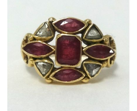 A 14k ruby and diamond ring, finger size K/L.