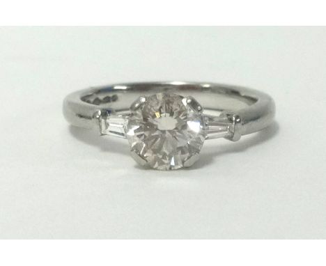 An 18ct diamond solitaire, approx 1.05 carats, with insurance assessment indicating colour K and clarity VVSI, (diamond weigh