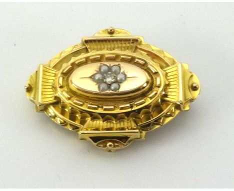 A antique 15ct gold diamond and pearl set brooch, approx 37mm wide, the reverse with hair lock window.