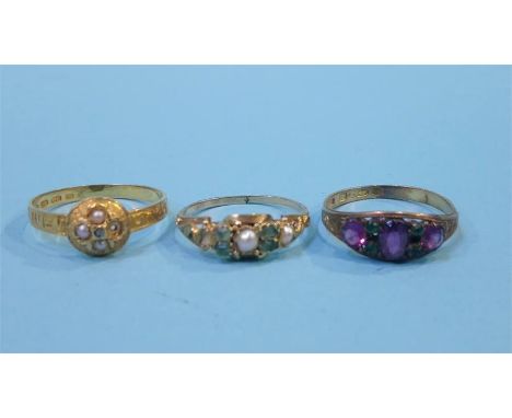 An 18ct ring set with seed pearls, a15ct ring and an unmarked ring set with emeralds and pearls