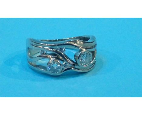 An 18ct white gold ring, set with diamonds, 10.3grams, approx. size T