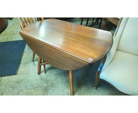 An Ercol table and single chair