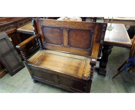 An oak barley twist monks bench