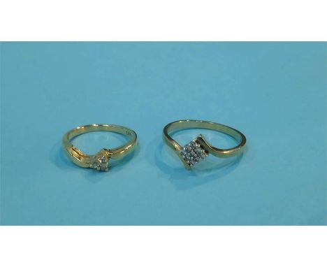 A 14ct gold diamond ring and another gold diamond ring