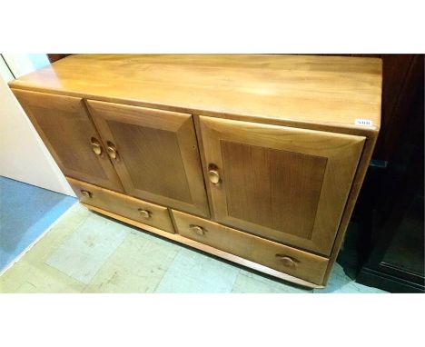 An Ercol Golden Dawn sideboard, 130cm wide