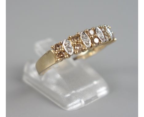 Ring mit Diamanten, klar und Fancy Brown , 375er Gold, Gew.3,07g, 10 Diamanten im Braunton, 4 klare Diamanten, Krappenfassung