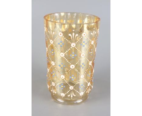 Becher mit Emaillemalerei, um 1890, bernsteinfarbenes Glas mit geometrischem Emailledekor, H.11,2cmCup with enamel painting, 