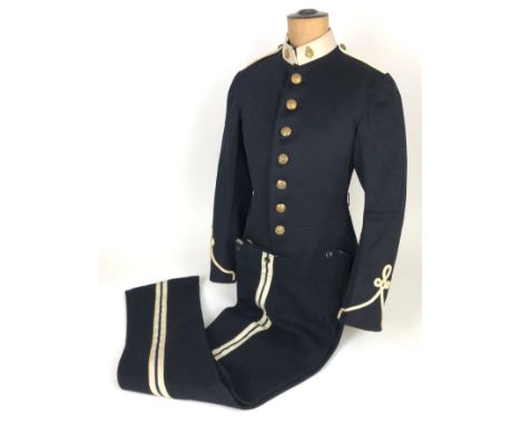Army Service Corps issue dress uniform. Dark blue woollen cloth with white facings to the cuff lace, collar and plaited shoul