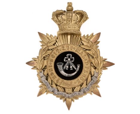 Durham Light Infantry Victorian Officer's helmet plate badge c. 1881-1901. Good gilt crowned star mounted with Garter and lau