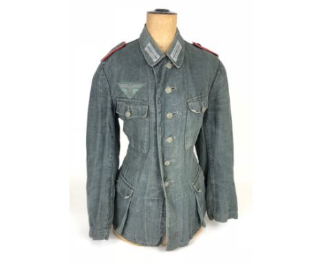 German Third Reich WW2 Army reed green denim Field Service Tunic. A very good scarce four pocket herringbone issue complete w