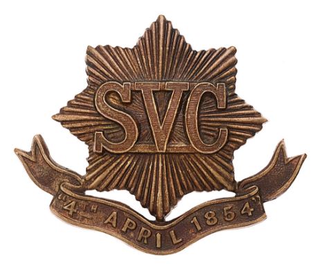 China. Shanghai Volunteer Corps cap badge. Good scarce British made die-stamped bronzed brass eight pointed star resting on 4