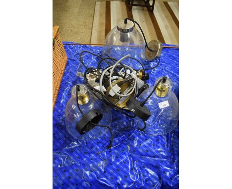 THREE GLASS PENDANT LIGHT FITTINGS
