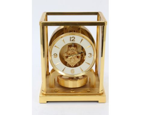 Jaeger-LeCoultre Atmos clock in gilt brass case (some glazed panels missing), 22.5cm high CONDITION REPORT Two of the glass p