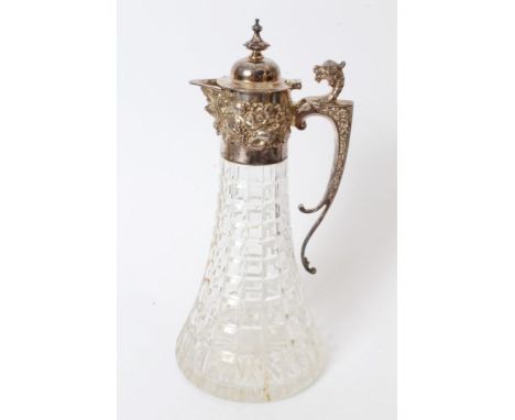 Contemporary silver mounted hobnail cut glass claret jug of tapering form, the mount with raised rococo shell and floral deco