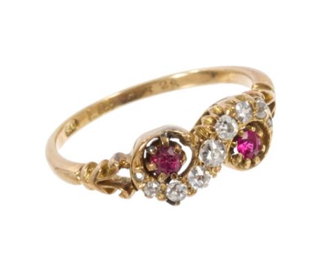 Late Victorian ruby and diamond crossover ring with two rubies and old cut diamonds in a crossover design with pierced should