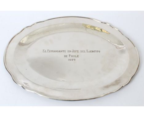 Contemporary Chilean white metal tray of shaped oval form, with dished centre engraved - 'EL COMANDANTE EN JEFE DEL EJERCITO 