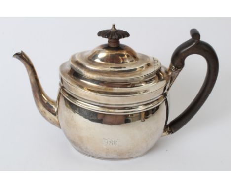 George III silver teapot of oval form, with reeded borders, ebonised loop handle and hinged domed cover with ebonised finial,