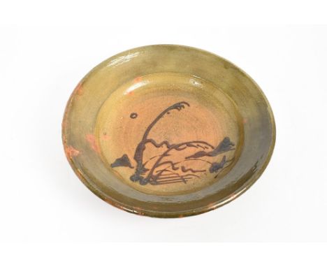 Bernard Leach slip-trailed dish with trailed ornament on green ground, monogram and impressed marks, 32cm diameter CONDITION 