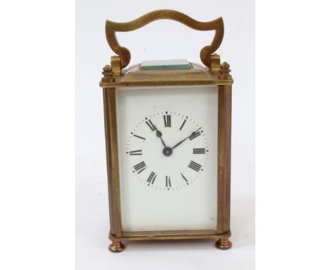 Late 19th century brass carriage clock with enamel dial, 14cm, in original leather covered carrying case (key present) CONDIT