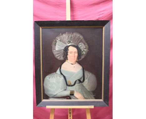 19th century English School oil on canvas - portrait of a lady in a elaborate hat, framed, 74cm x 62cm