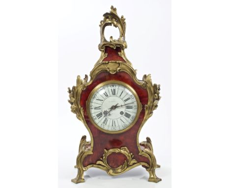 Late 19th century French Louis XV revival mantel clock with ornate ormolu and red tortoiseshell veneered case, enamel dial wi
