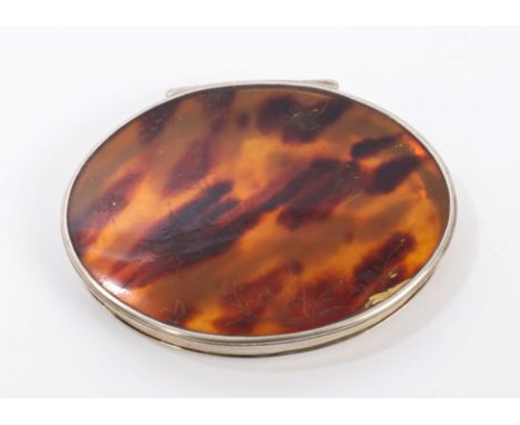 George III tortoiseshell and silver snuff box of oval form, the hinged, slightly domed cover engraved with birds, buildings a