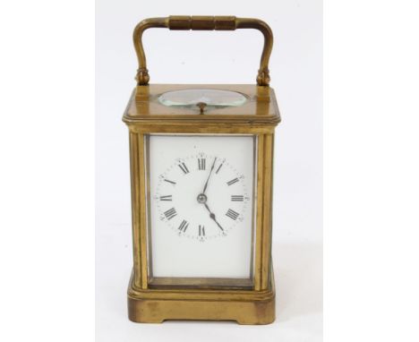 Late 19th century French brass repeating carriage clock striking the half hours, in brass case, with original leather travel 