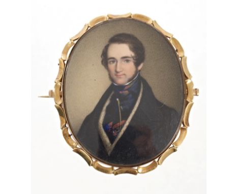 19th century oval portrait miniature on ivory depicting a young gentleman, in a glazed yellow metal frame, with brooch / clas