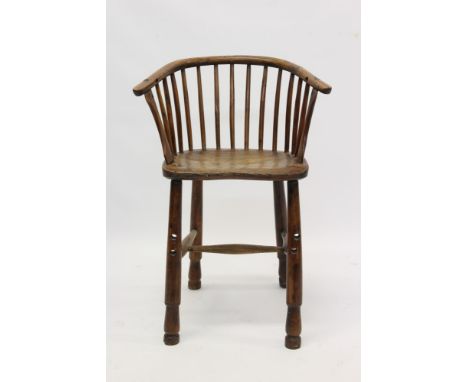 Unusual 19th century yew and elm child's high chair with stick back and saddle seat on turned legs with H-shaped stretcher