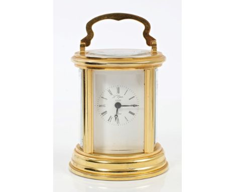 Contemporary gilt brass carriage clock in oval-form case, with white enamel dial, signed - 'L'Epee 1839 Paris', 11cm high (ke