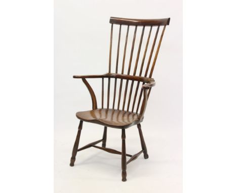 19th century elm, beech and fruitwood stick back Windsor chair with high back and swept arms, having saddle seat on splayed l