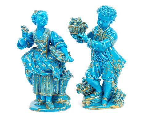 Pair Victorian Minton porcelain figures of boy and girl with baskets of flowers with gilt decoration on turquoise blue ground
