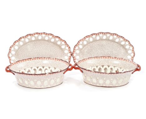 Pair early 19th century Spode creamware baskets and stands, circa 1800, with printed fern and iron-red borders, marked on bas