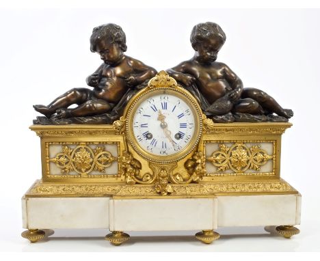 Good quality 19th century French bronze ormolu and white marble mantel clock, mounted with two reclining putti with dove, cir