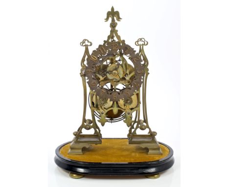 19th century brass skeleton clock with pierced architectural frame, twin fusee movement striking on a gong, silvered and gilt
