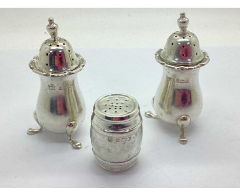 A Pair of Matched Hallmarked Silver Salt and Pepper Shakers, Birmingham 1919, with flared rim and decorative finial, raised o