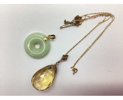 A Decorative Old Cut Diamond and Faceted Stone Set Pendant, the teardrop shape stone of faceted cut, to collar style surmount