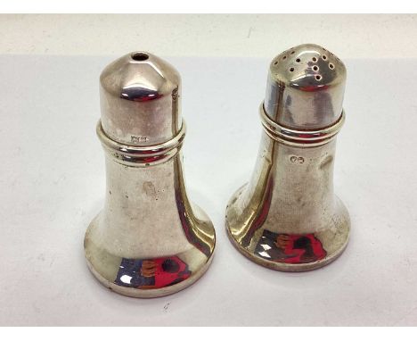 A Pair of Vintage Hallmarked Silver Salt and Pepper Shakers, S&amp;M, Birmingham 1974, of plain design with circular spreadin