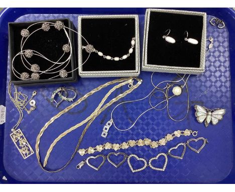 An Assortment of "925" and Other Jewellery, to include Fossil pendant necklace, inlaid bracelet and earring set, openwork hea