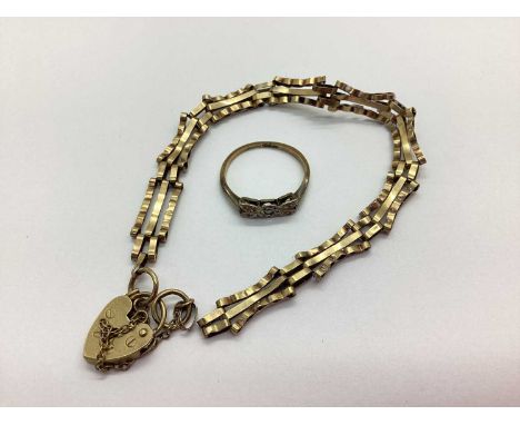 A 9ct Gold Gate Link Bracelet, (damages), to 9ct gold heartshape padlock style clasp, together with a vintage dress ring (sto