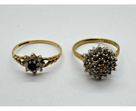 A 9ct Gold Stone Set Floral Cluster Ring, between decorative bifurcated shoulders, stamped "CZ" (finger size O); A 9ct Gold C