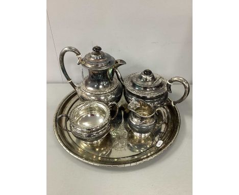 An EPNS Four Piece Teaset, makers mark GWS, of sinuous design with bead and reel rim, scrolling loop handles, together with a