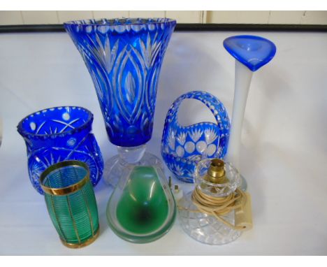 Collection of coloured cut glass to include a large blue vase, blue lamp base, blue basket and 3 other items